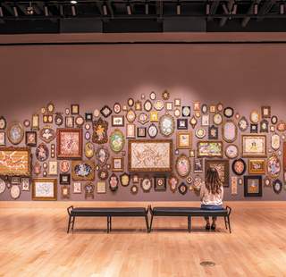 Wall of art in a gallery