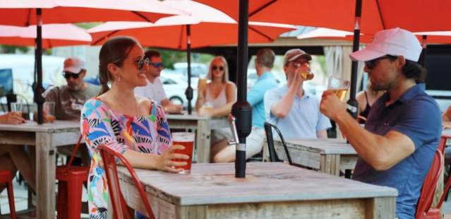 Couple sipping beer at New Sarum Brewing Company