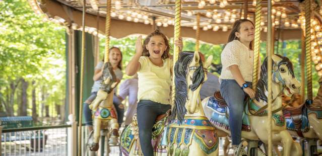 Kids on Carousel at Dan Nicholas Park