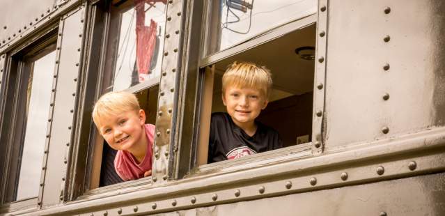 Kids in windows of train