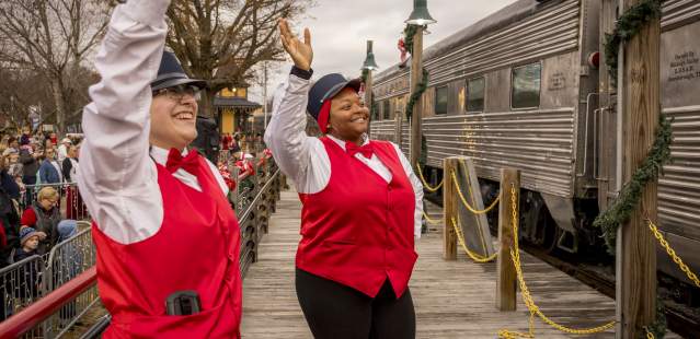 N.C. Transportation Museum workers waving to Polar Express