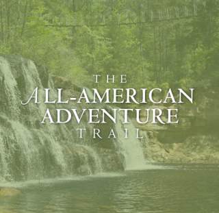 The All-American Adventure Trail with photo of waterfall and rope bridge above
