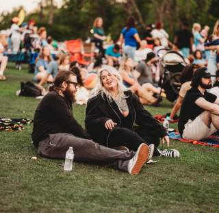 A couple enjoy live music in Festival Park in Fayetteville, NC.