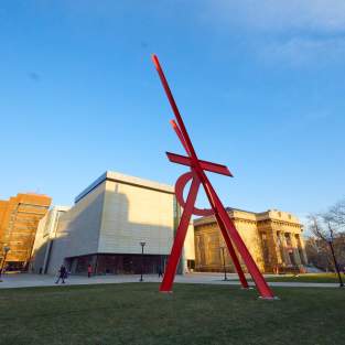 Large red sculpture outside of UMMA
