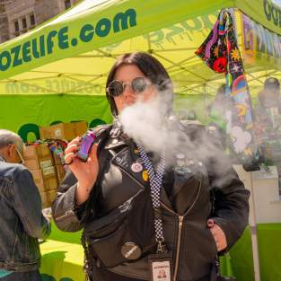 Woman smoking at Hash Bash