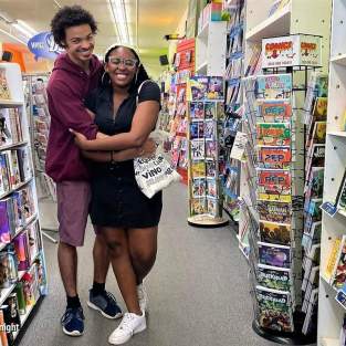 Couple Shopping at Vault of Midnight