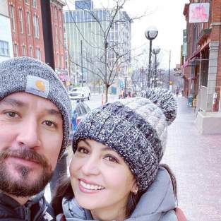 Couple taking selfie in winter