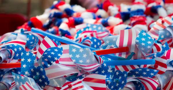 Small flags on a table at 4th of July event in Carrboro