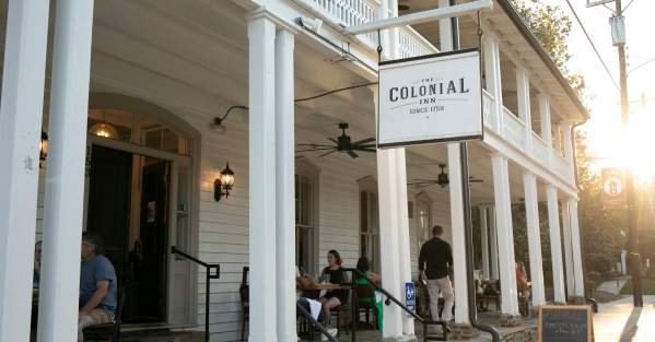 People Gathering on the Porch at The Colonial Inn, Hillsborough