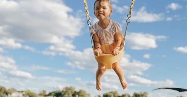 child on a swing