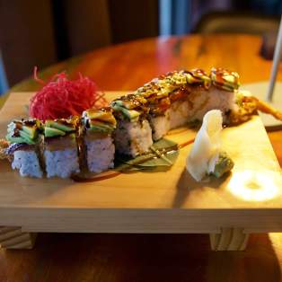 The Black Dragon Roll at Chuck's Fish placed on a board