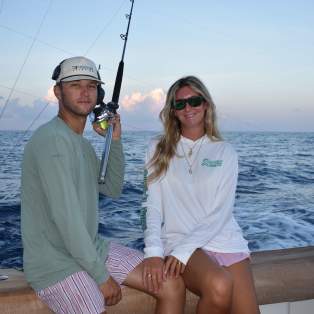 Couple-offshore-fishing-twat
