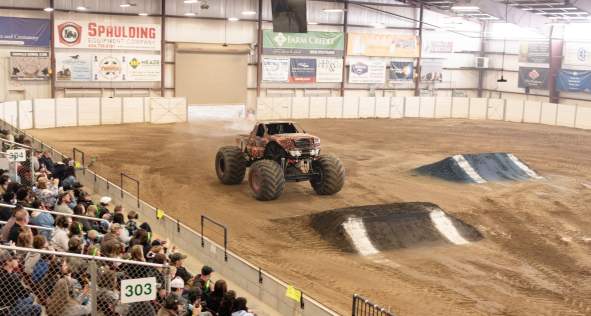 monster truck about to jump a ramp