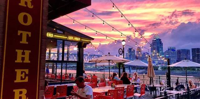 Pink and purple sunset over Cincinnati Skyline, seen from Brothers restaurant in Newport KY
