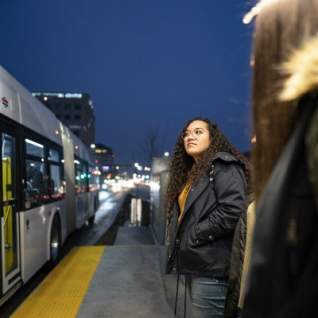 Girls Waiting at UVX Bus Stop