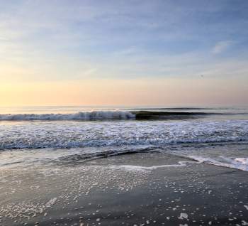 Waves on Beach in the Early Morning