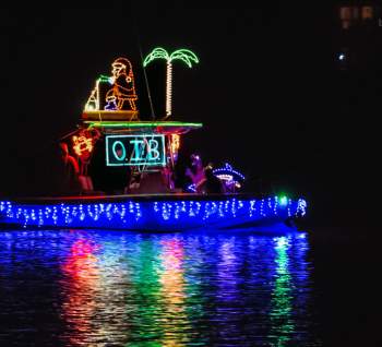 boat decorated in Christmas lights
