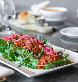 falafel salad and wine from delmonico restaurant in rapid city, sd