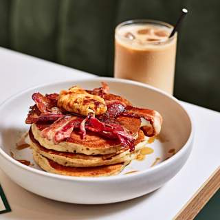 Stack of pancakes and iced latte at Neighbourhood Belfast