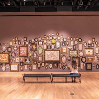 Wall of art in a gallery