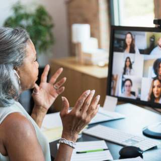 woman attending virtual meeting