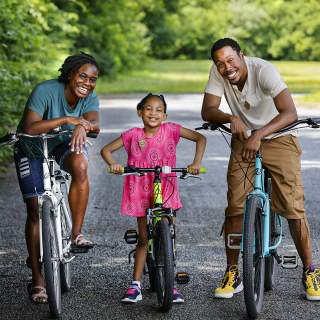 african american family bikes park
