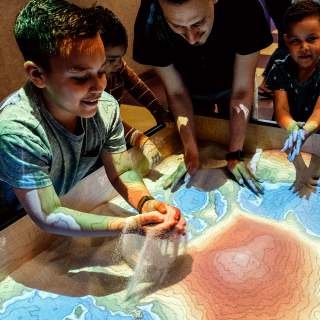 Boy playing with Sand Table at Science Central &copy;Luke Menard for Visit Fort Wayne