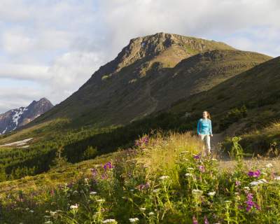 Woman hiking by Flattop Mountain in Anchorage