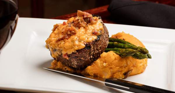 Filet served with sweet potatoes and asparagus