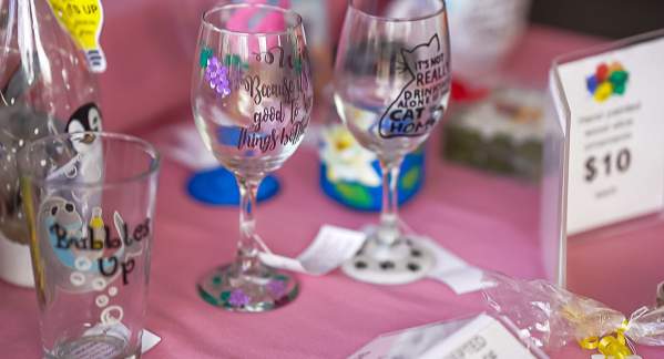 A selection of painted wine glasses and beer glasses