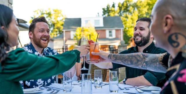 friends cheering with drinks