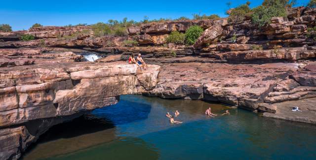 Enjoy a swim in a crystal-clear freshwater oasis after a scenic hike.