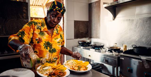 Woman cooking afro Caribbean dishes at Bocas del Toro