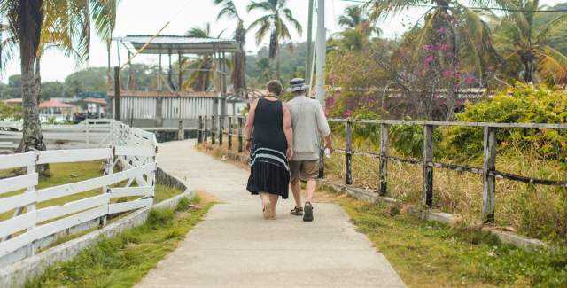 A couple taking a tranquil walk, sharing a calm and serene moment