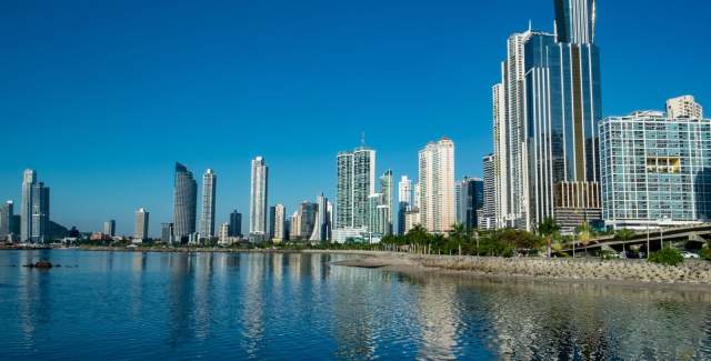 Skyline of Panama City with modern Buildings in a blue sky