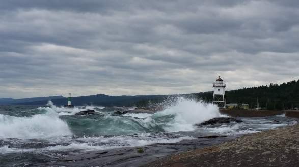 Waves breaking on artist point lighthouse