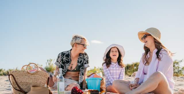 LGBT family on beach