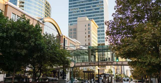 View looking south on main street in Salt Lake in summer time showing the street bridge at City Creek Center