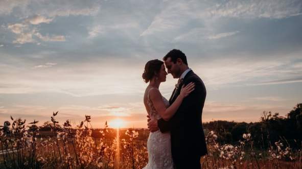 Wedding sunset in a field
