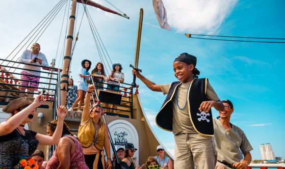 Kid dressed as pirate on Black Dragon Cruises
