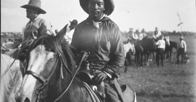 African American and Cherokee rodeo pioneer Bill Pickett invented steer wrestling. Photo by Fred S. Bard, circa 1910. Photograph courtesy of Oklahoma Historical Society, 14338.