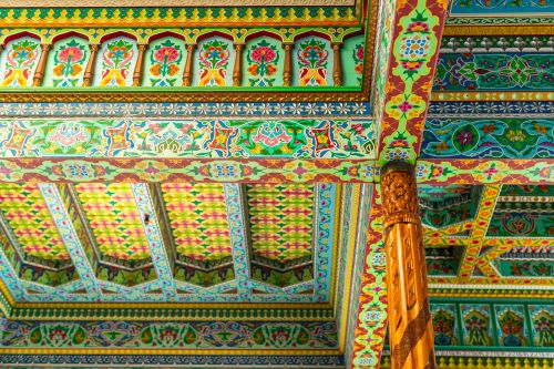 The colorful patterned interior ceiling of the Boulder Dushanbe Teahouse