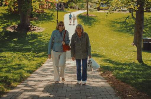 Old women walking on a park