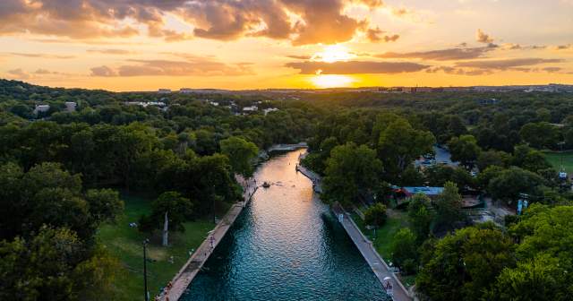 Aerial view of Barton Springs Pool at Sunset in Austin Texas