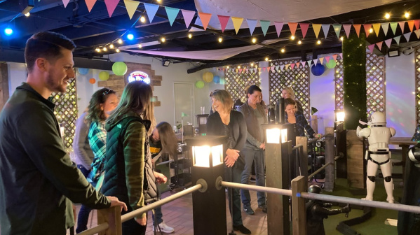 A group of friends enjoying mini golf at Nine Below on Milwaukee's East Side