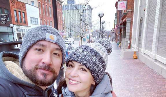 Couple taking selfie in winter