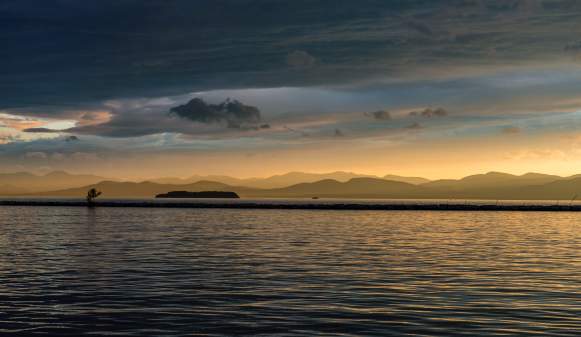 This is a beautiful sunset over looking Lake Champlain along the Burlington Waterfront.