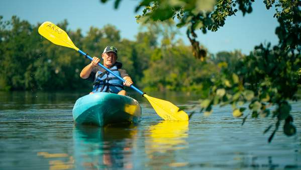 Man kayaking on Huron River
