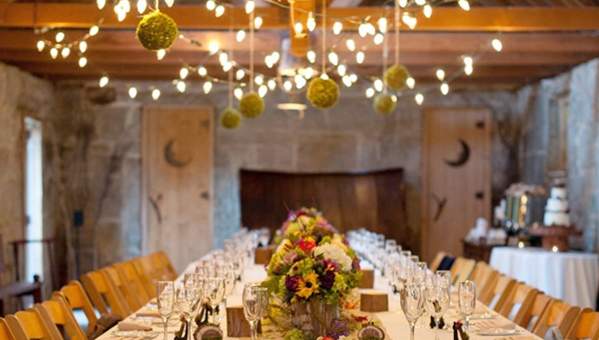 A long rectangular table with a formal table setting