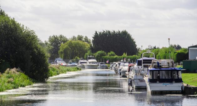 Boats docked on a riverbank in Brigg